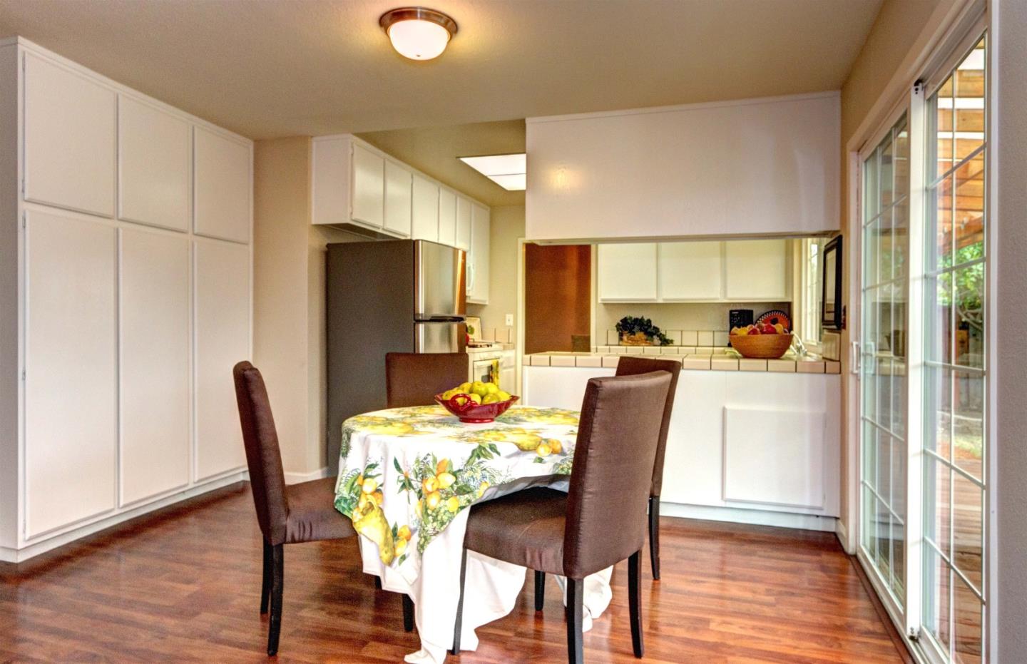 2708 Glen Ferguson Circle San Jose, CA 95148 - Photo 9 of 23 a dining room with furniture and window