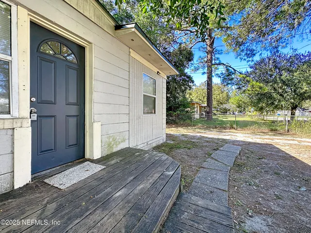 a view of backyard of house