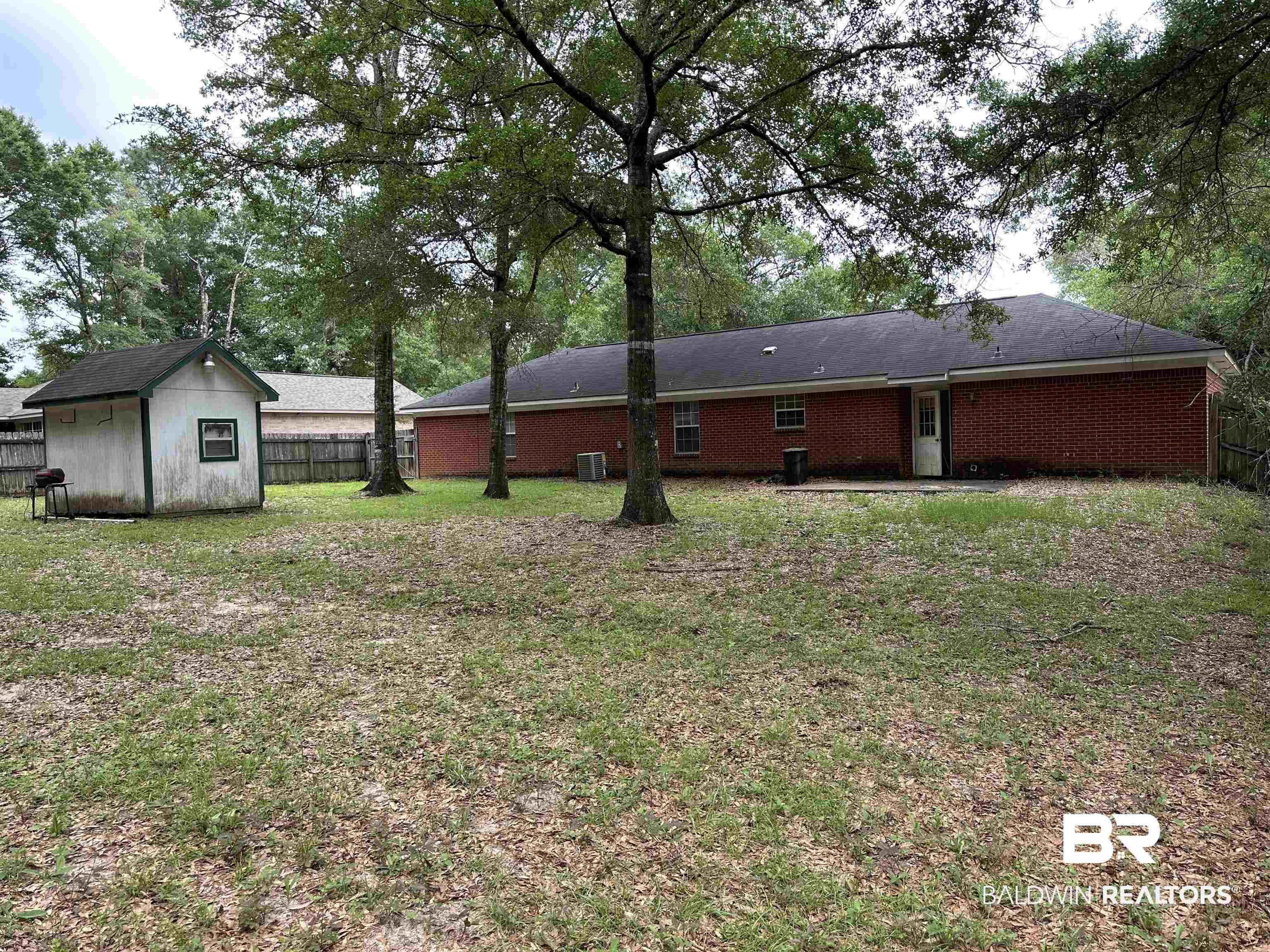 161 Robbins Boulevard Daphne, AL 36526 - Photo 8 of 23 Rear view of house featuring central air condition unit
