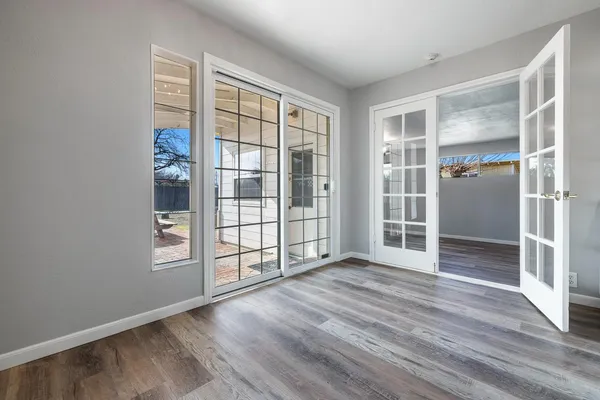 a kitchen with stainless steel appliances white cabinets and a stove