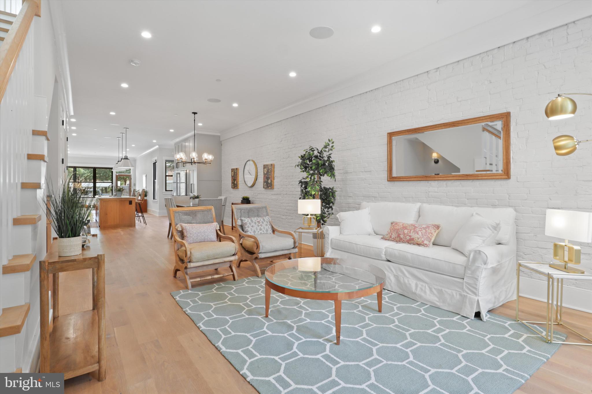 1432 G Street Southeast Washington, DC 20003 - Photo 3 of 56 a living room with furniture and a table