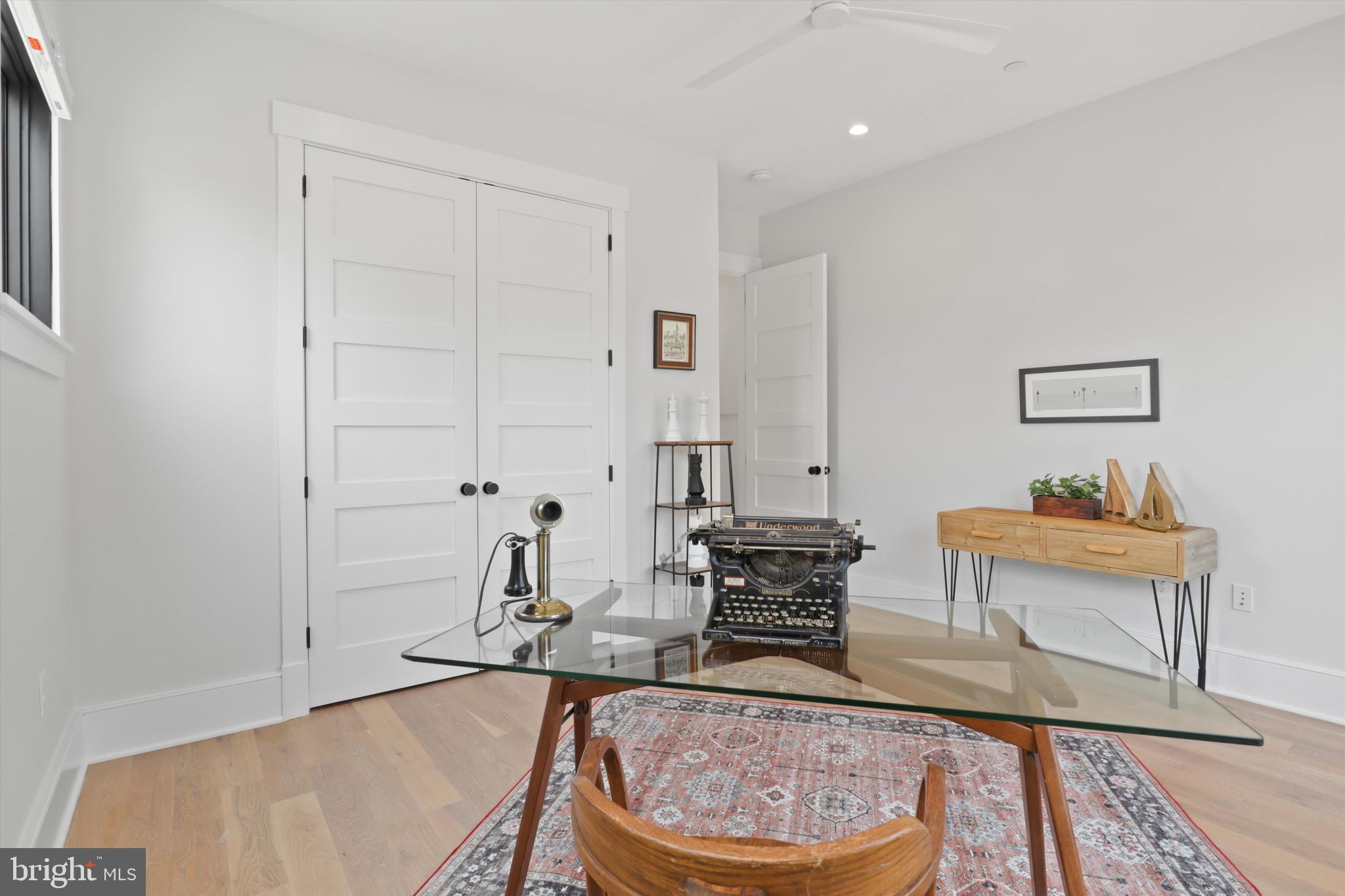 1432 G Street Southeast Washington, DC 20003 - Photo 34 of 56 a living room with table chairs and wooden floor