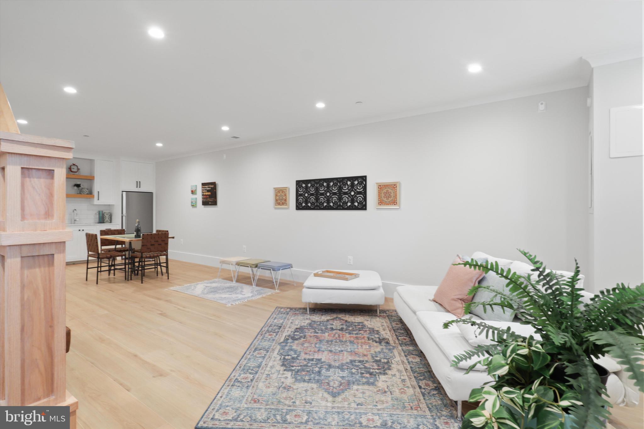 1432 G Street Southeast Washington, DC 20003 - Photo 35 of 56 a living room with furniture