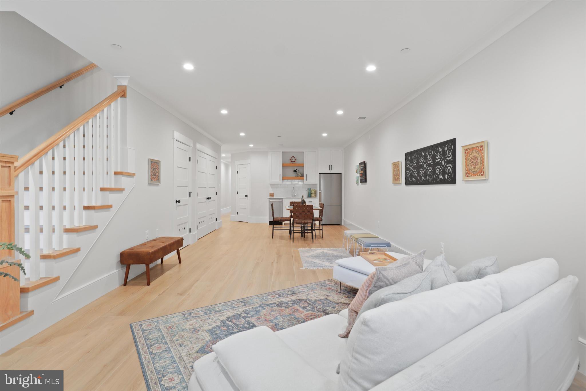1432 G Street Southeast Washington, DC 20003 - Photo 36 of 56 a living room with furniture and wooden floor