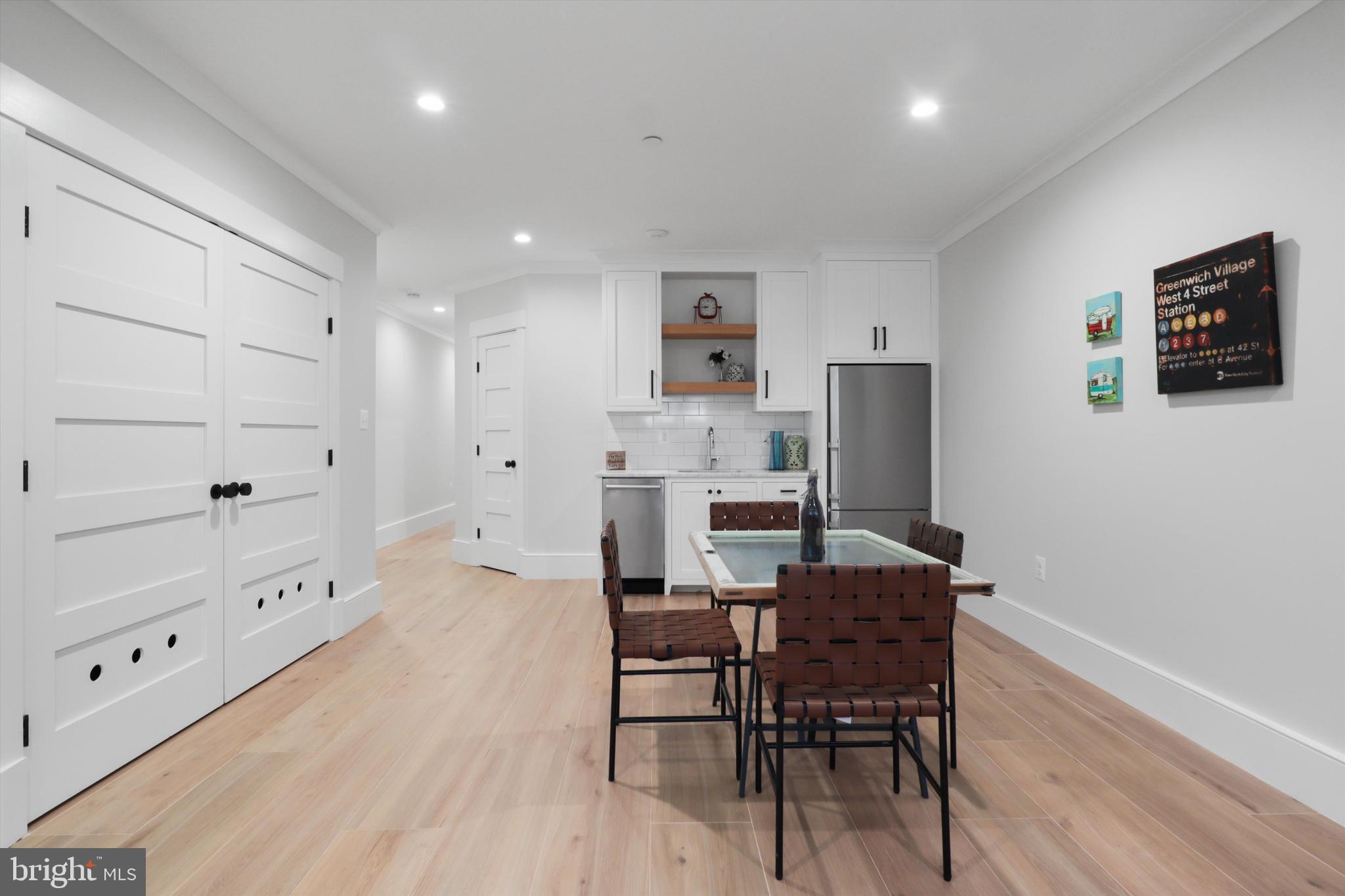 1432 G Street Southeast Washington, DC 20003 - Photo 38 of 56 a view of a dining room with furniture