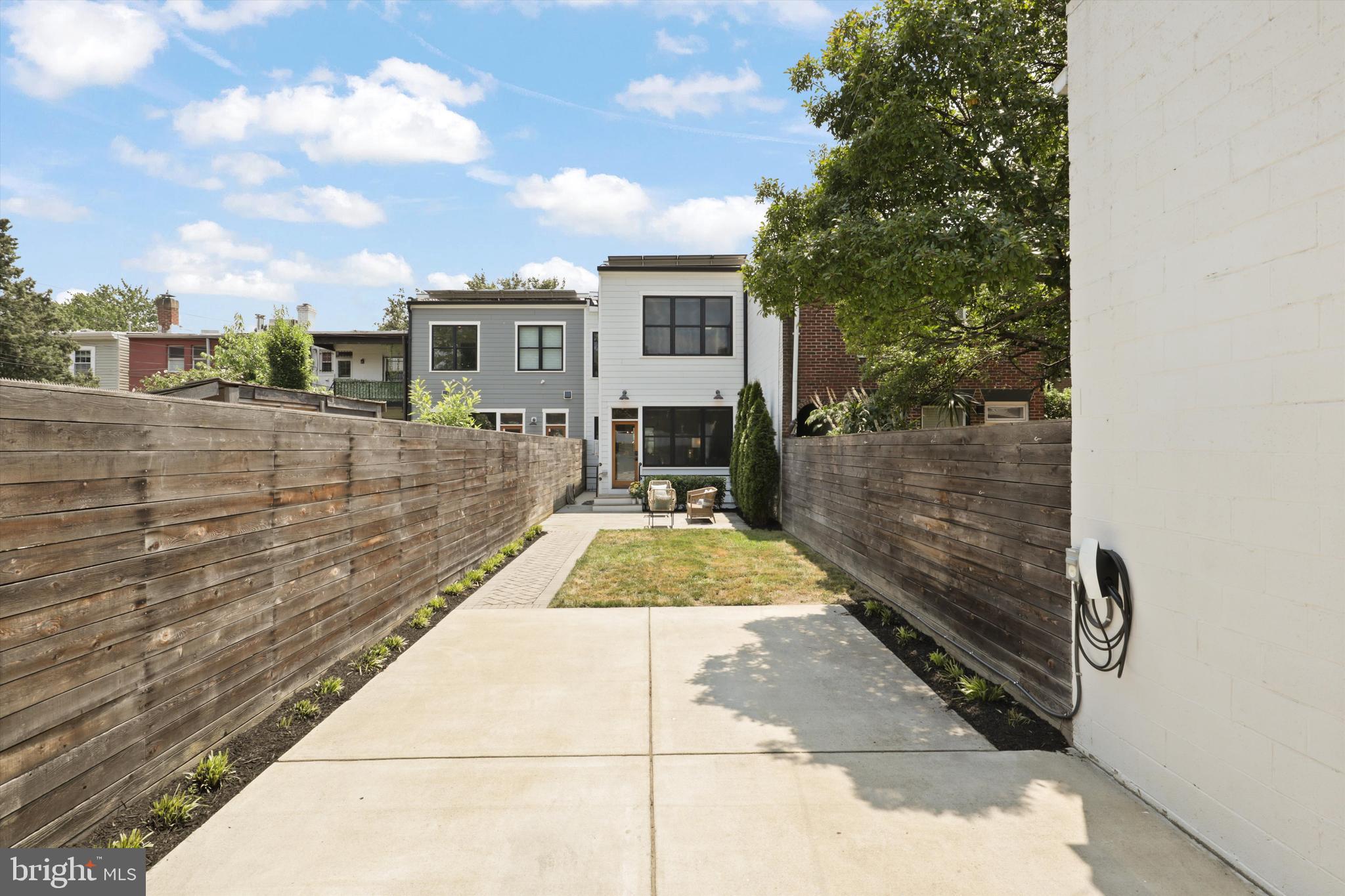 1432 G Street Southeast Washington, DC 20003 - Photo 47 of 56 a view of a backyard with large trees