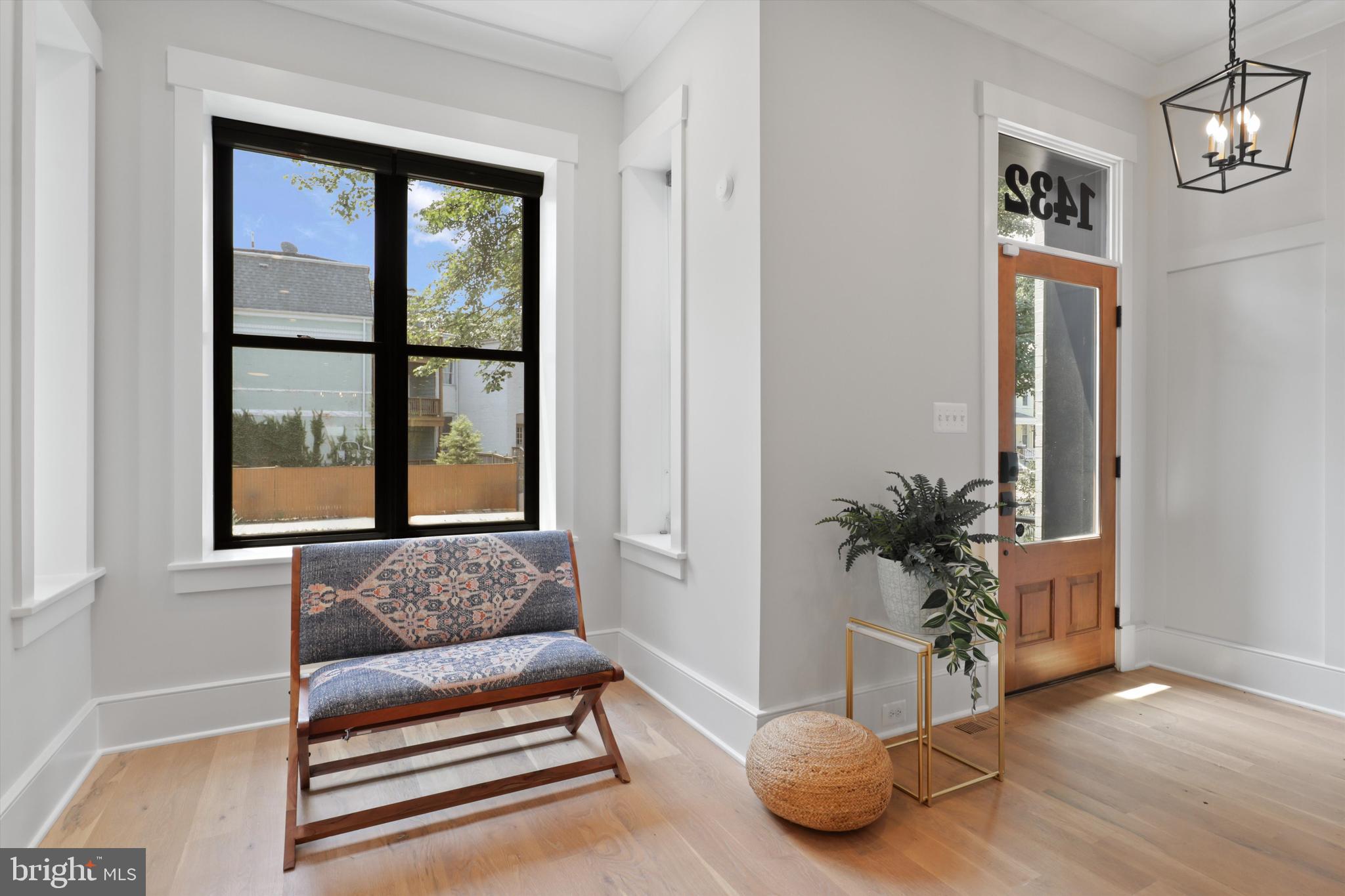 1432 G Street Southeast Washington, DC 20003 - Photo 5 of 56 a living room with furniture and a window