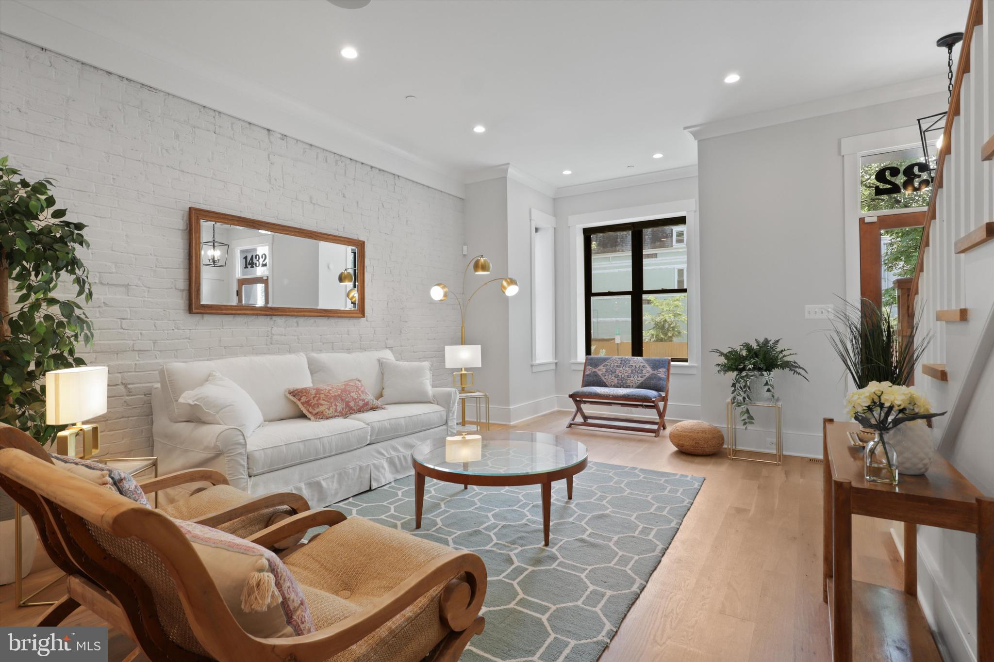 1432 G Street Southeast Washington, DC 20003 - Photo 6 of 56 a living room with furniture and a large window