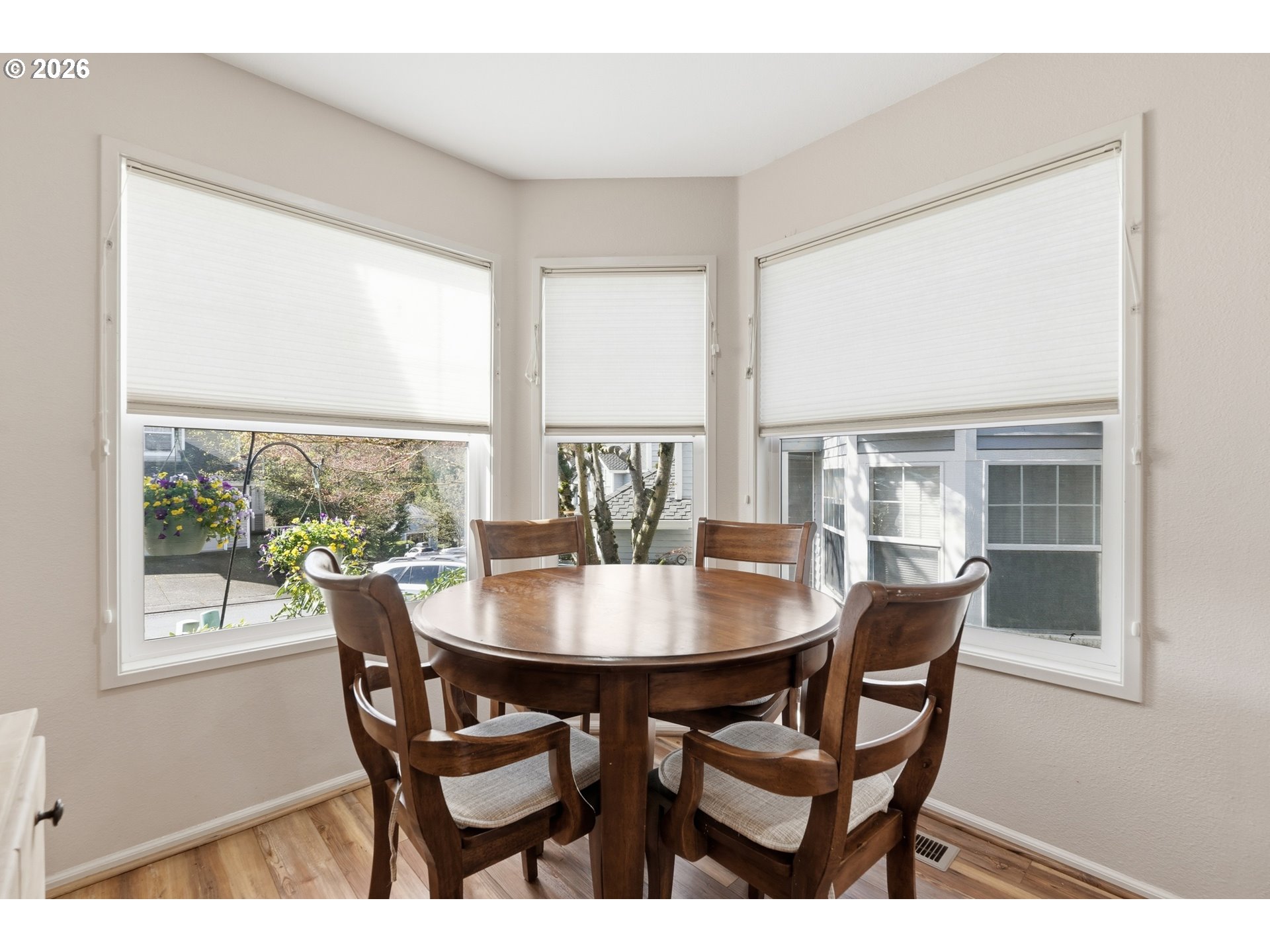 14885 Southwest Osprey Court Beaverton, OR 97007 - Photo 11 of 31 a view of a dining room with furniture and a window