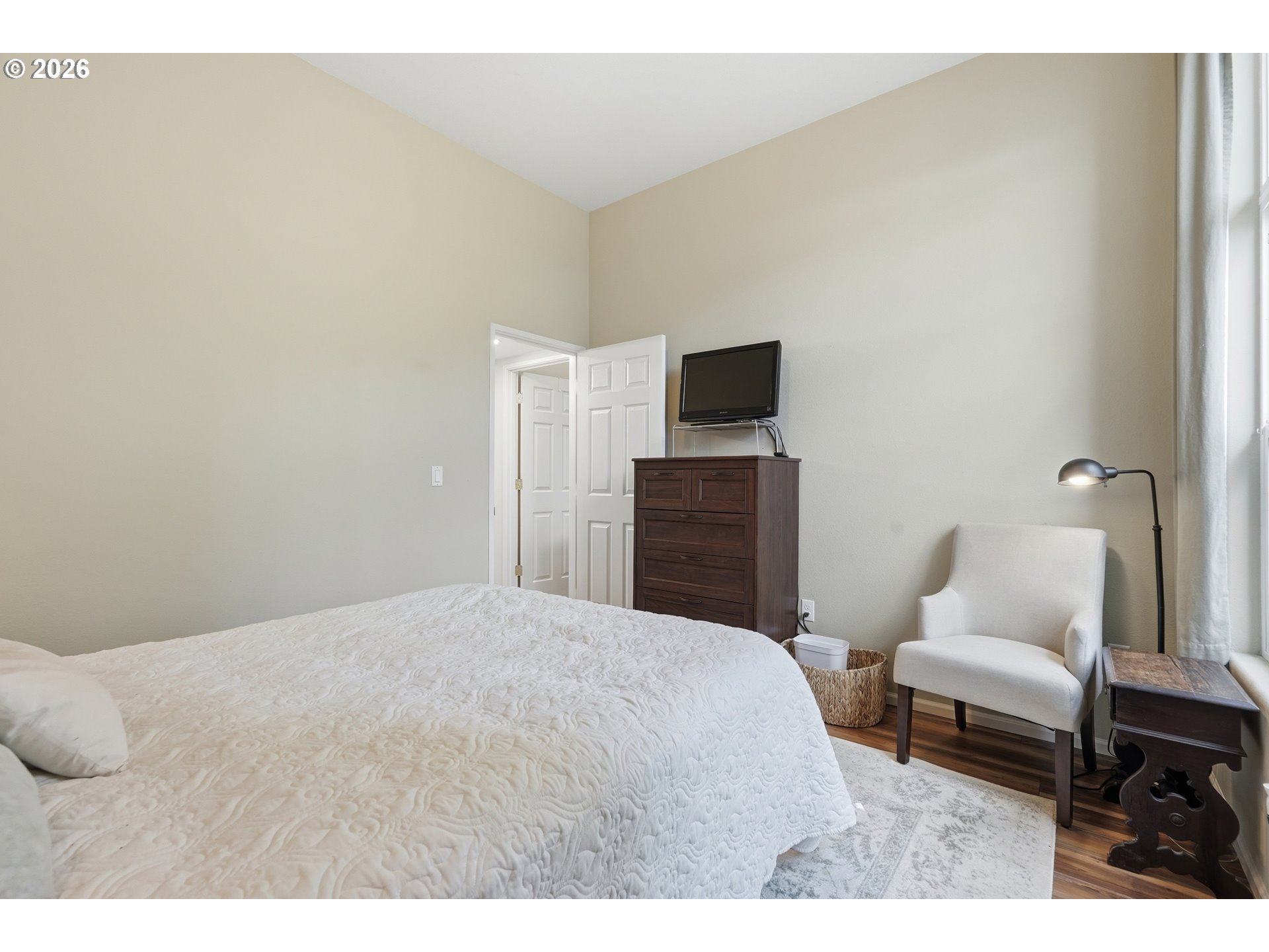 14885 Southwest Osprey Court Beaverton, OR 97007 - Photo 13 of 31 a bedroom with a bed and a television