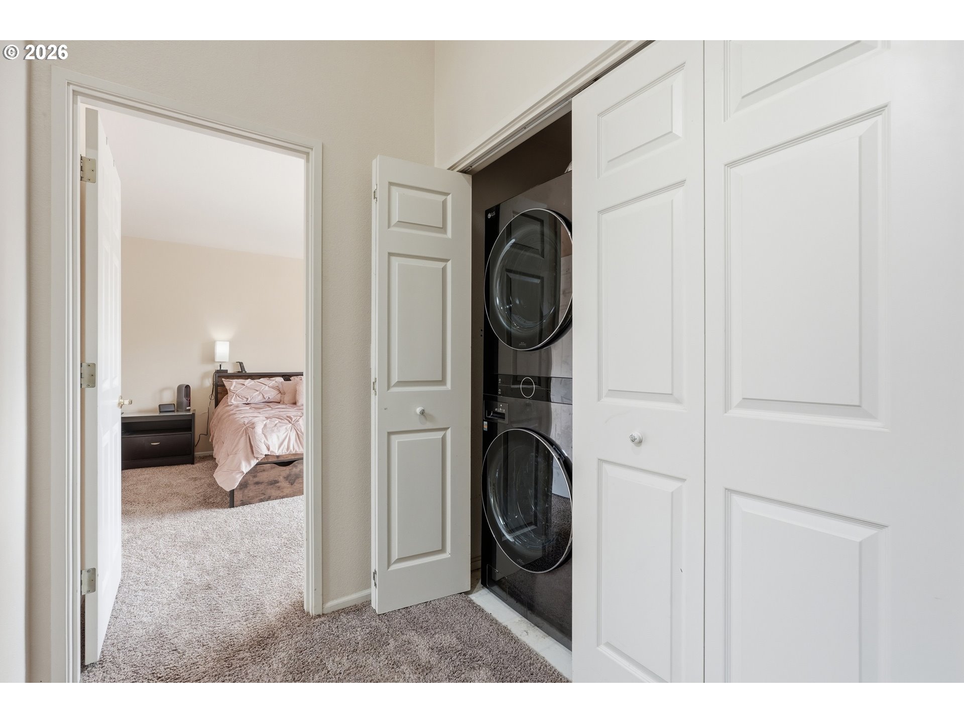 14885 Southwest Osprey Court Beaverton, OR 97007 - Photo 24 of 31 a view of a hallway with washer and dryer
