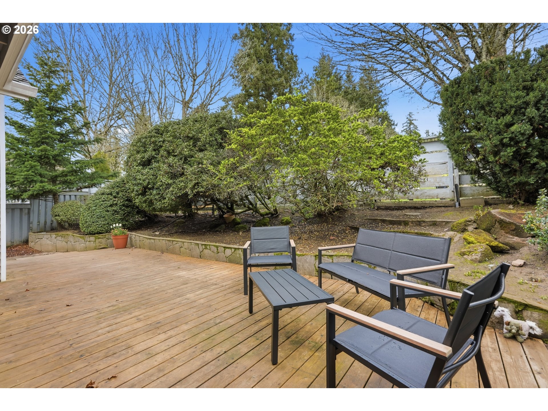 14885 Southwest Osprey Court Beaverton, OR 97007 - Photo 26 of 31 a view of a backyard with sitting area