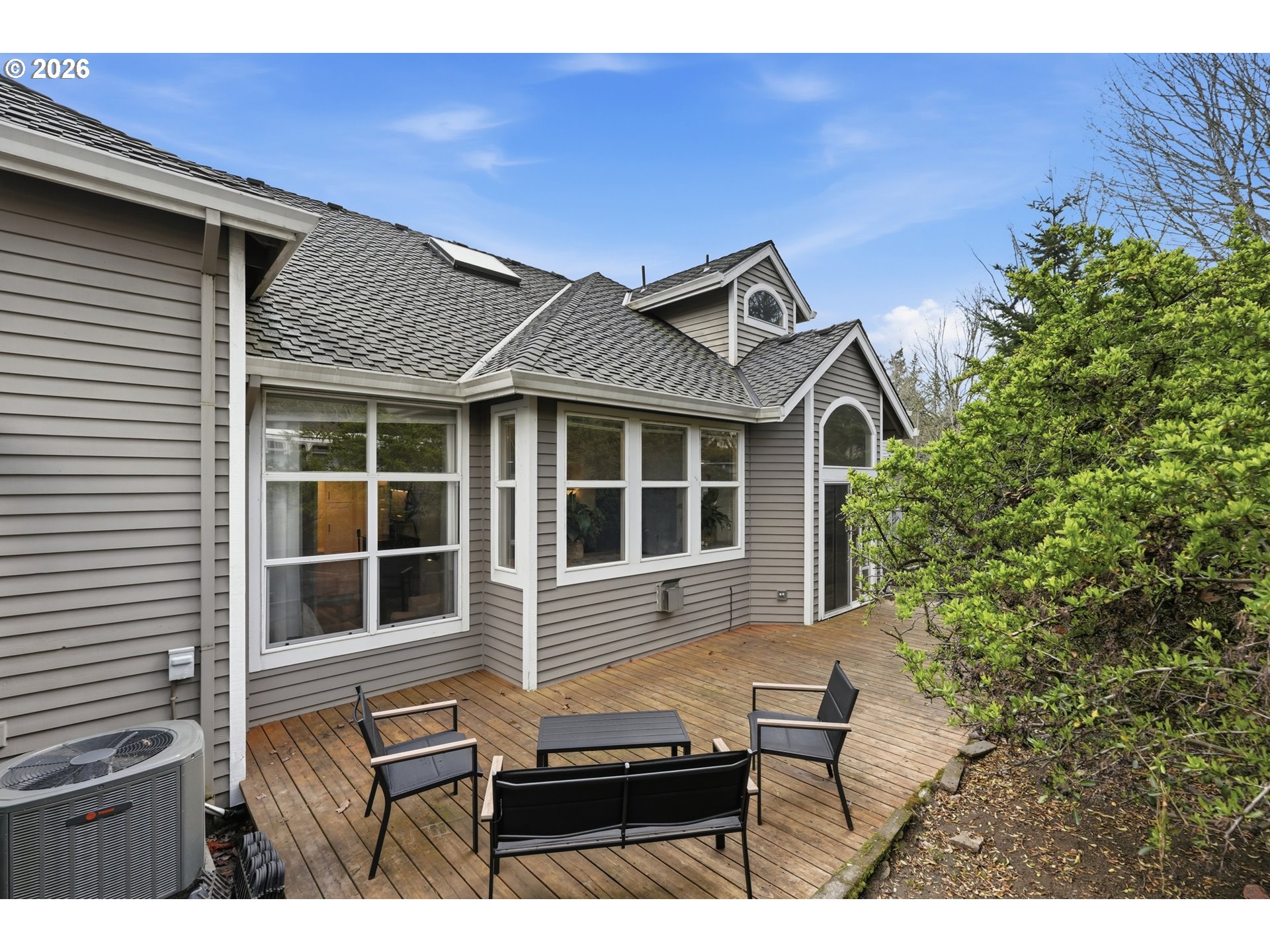 14885 Southwest Osprey Court Beaverton, OR 97007 - Photo 28 of 31 a backyard of a house with seating space