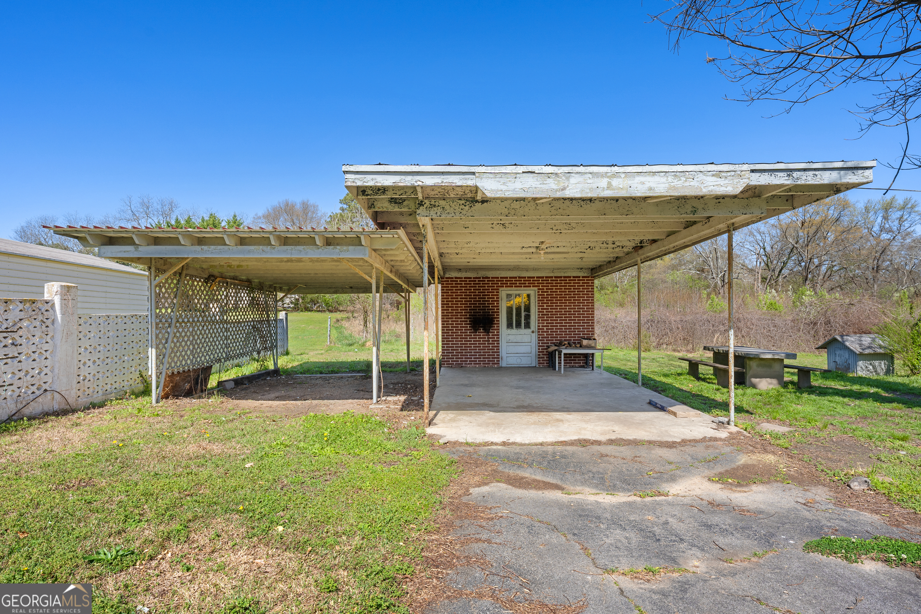 868 Fairview Street Hartwell, GA 30643 - Photo 30 of 42 a view of a house with a patio