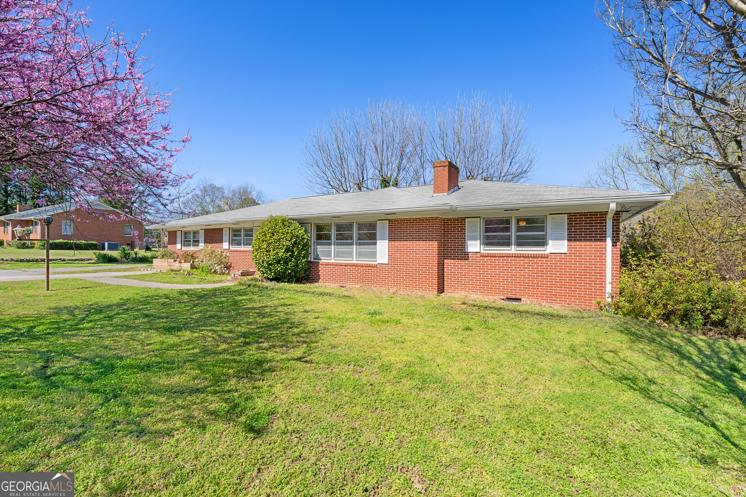 868 Fairview Street Hartwell, GA 30643 - Photo 4 of 42 a view of a house with a backyard