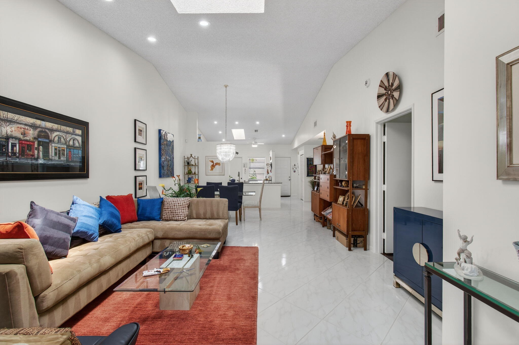 6368 Mill Pointe Circle Delray Beach, FL 33484 - Photo 23 of 132 a living room with furniture and a flat screen tv