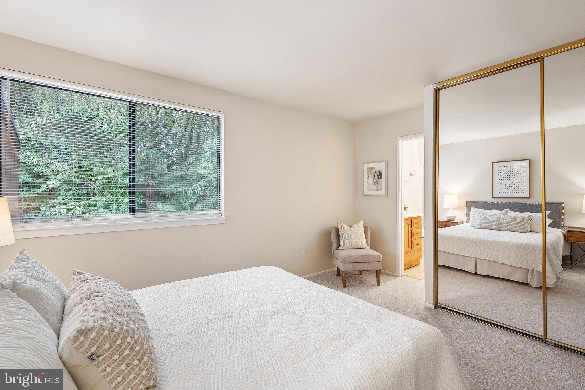2343 Glade Bank Way Reston, VA 20191 - Photo 20 of 38 a bedroom with a large bed and large window