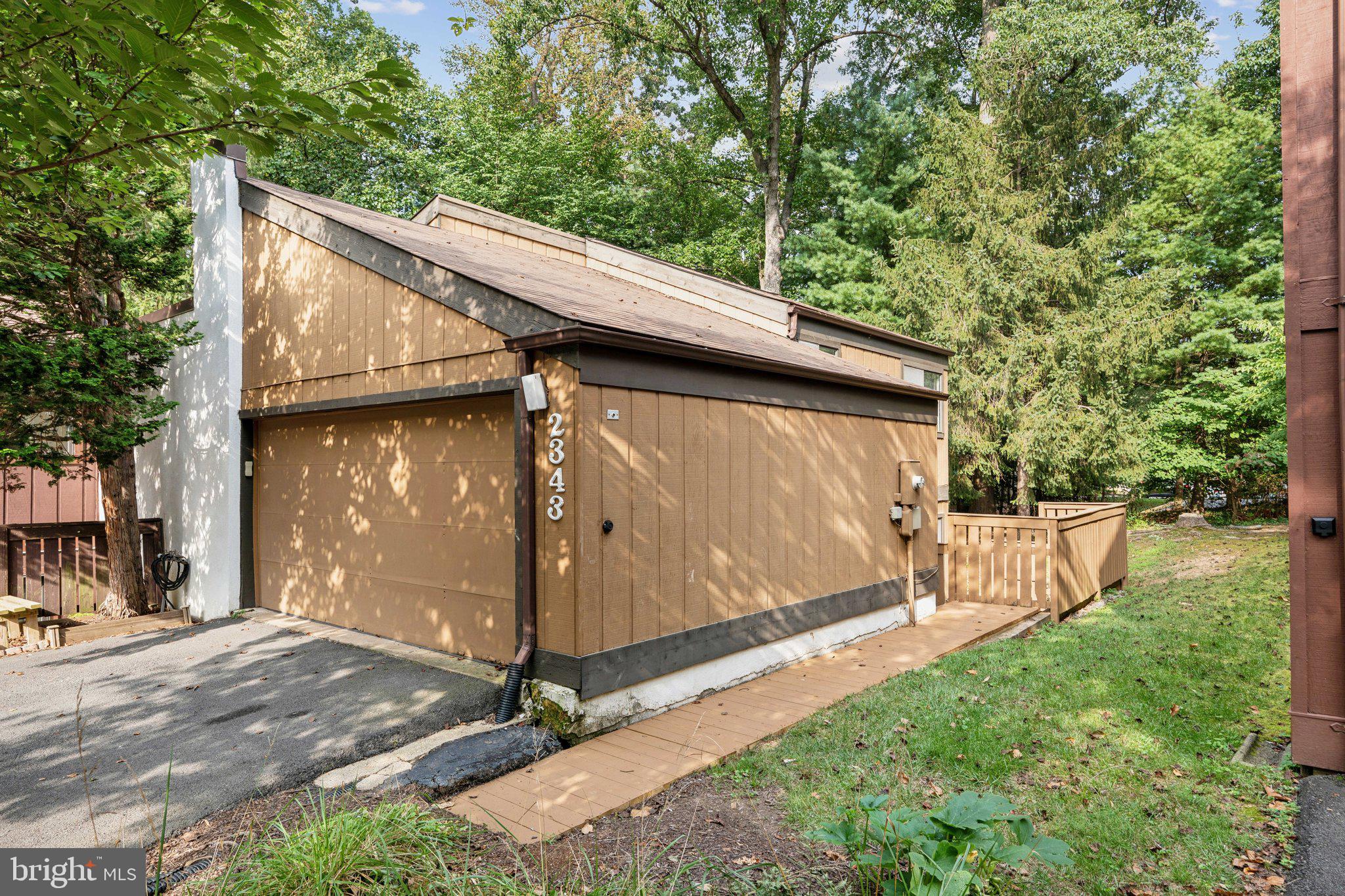 2343 Glade Bank Way Reston, VA 20191 - Photo 35 of 38 a view of backyard with tree