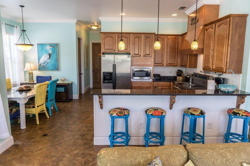 4554 Biscayne Way Destin, FL 32541 - Photo 11 of 33 a kitchen with lots of counter space