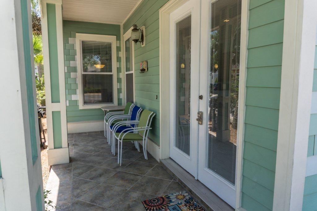 4554 Biscayne Way Destin, FL 32541 - Photo 12 of 33 a view of a hallway and a livingroom with furniture