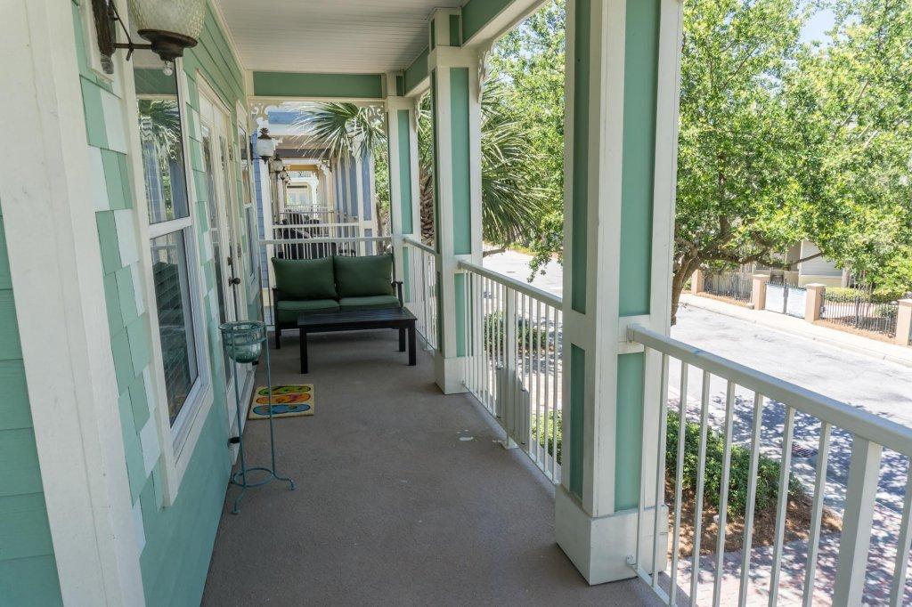 4554 Biscayne Way Destin, FL 32541 - Photo 19 of 33 a view of a porch with furniture