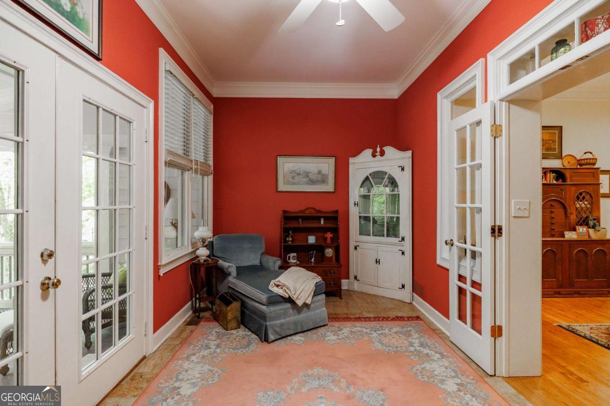 835 Timothy Road Athens, GA 30606 - Photo 27 of 65 a living room with furniture and a large window