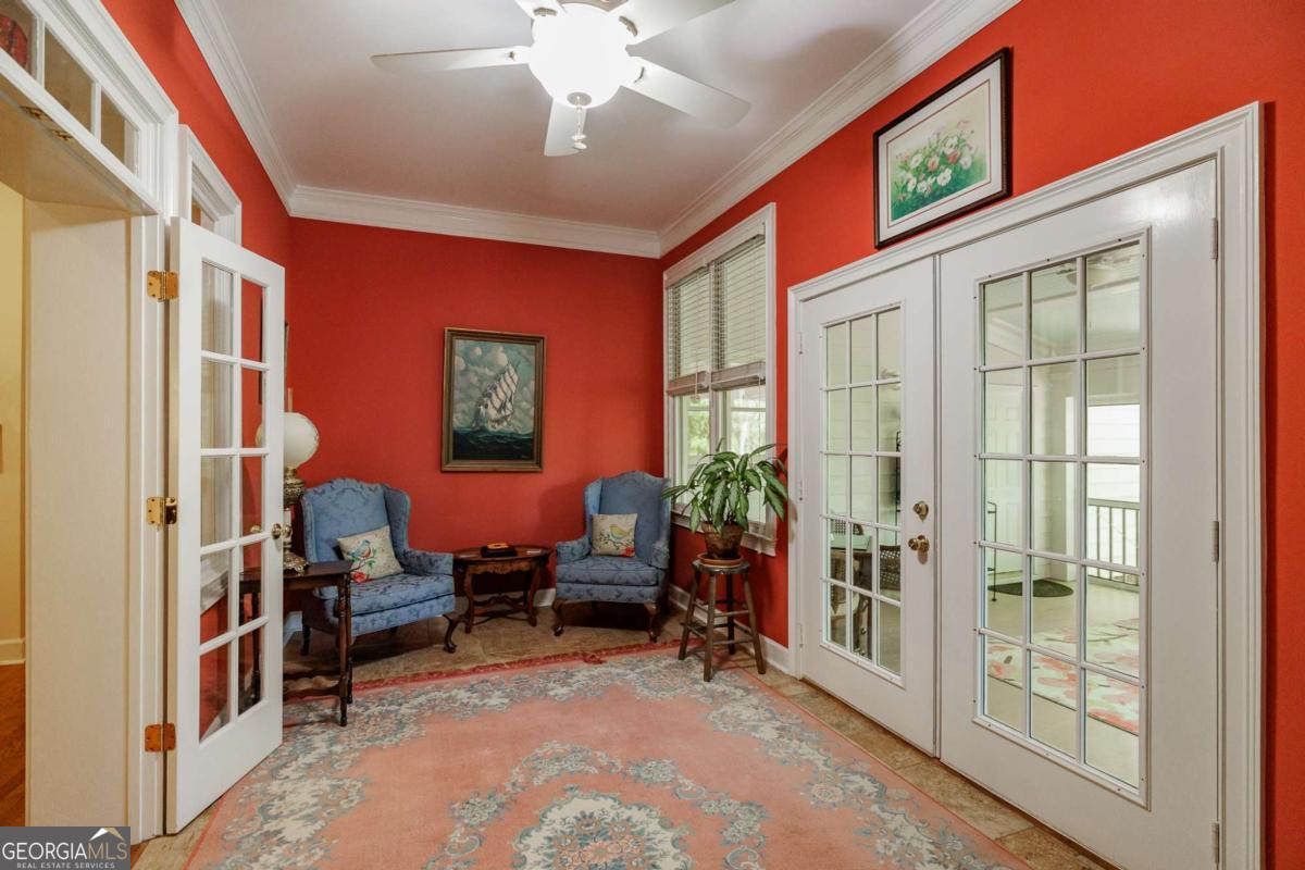 835 Timothy Road Athens, GA 30606 - Photo 28 of 65 a view of a livingroom with workspace and windows