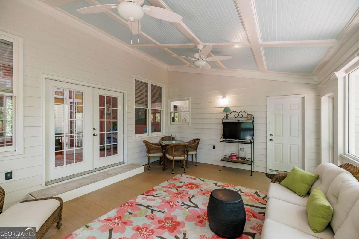 835 Timothy Road Athens, GA 30606 - Photo 31 of 65 a living room with furniture and a flat screen tv
