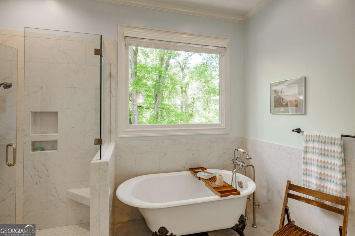 835 Timothy Road Athens, GA 30606 - Photo 37 of 65 a bathroom with a tub and sink
