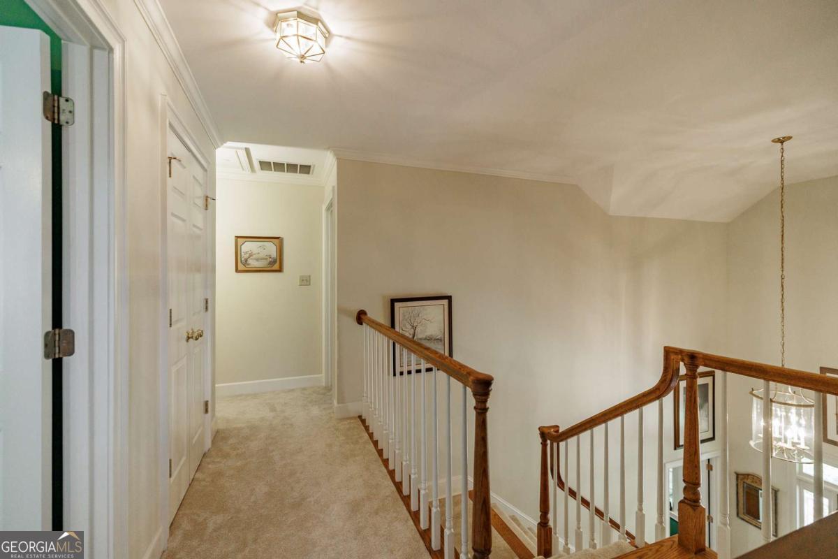 835 Timothy Road Athens, GA 30606 - Photo 40 of 65 a view of a hallway with staircase