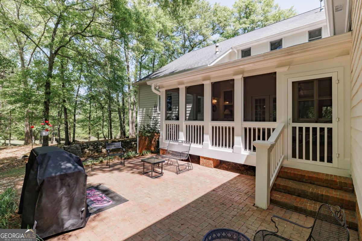 835 Timothy Road Athens, GA 30606 - Photo 50 of 65 a view of a house with backyard and sitting area