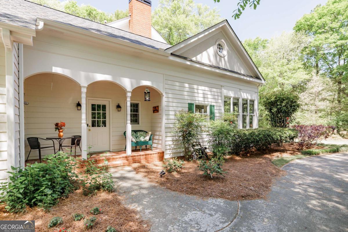 835 Timothy Road Athens, GA 30606 - Photo 57 of 65 a front view of a house with garden