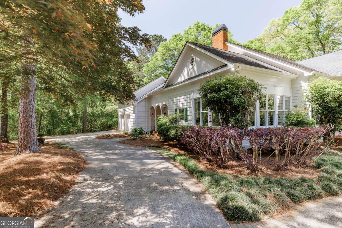 835 Timothy Road Athens, GA 30606 - Photo 60 of 65 a view of a house with a yard and potted plants