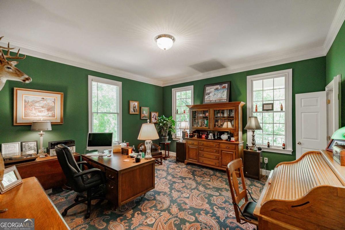 835 Timothy Road Athens, GA 30606 - Photo 8 of 65 a living room with furniture and a flat screen tv