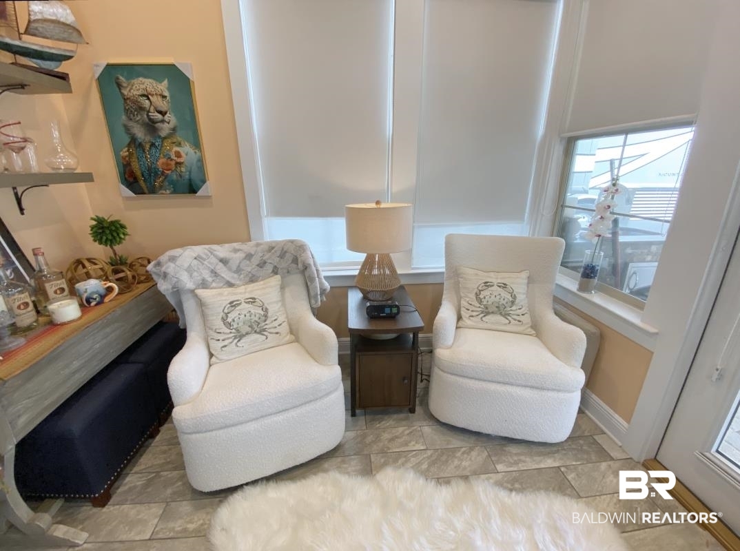 28888 Canal Road, Unit 32 Orange Beach, AL 36561 - Photo 8 of 29 Living area with healthy amount of natural light