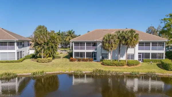 a house with swimming pool in front of it