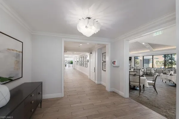 a view of a livingroom with furniture and a flat screen tv