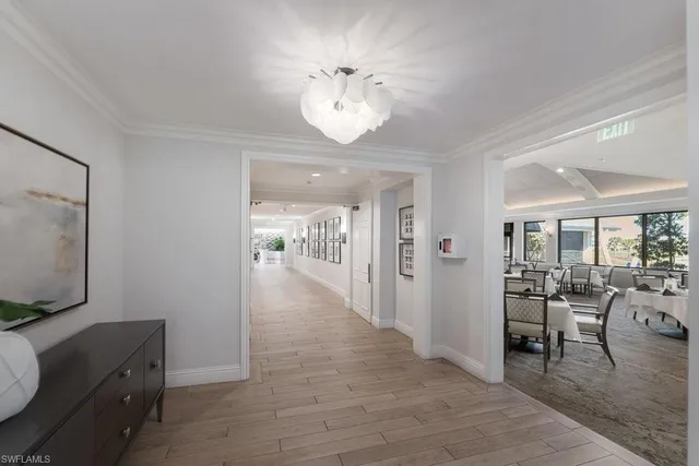 a view of a livingroom with furniture and a flat screen tv
