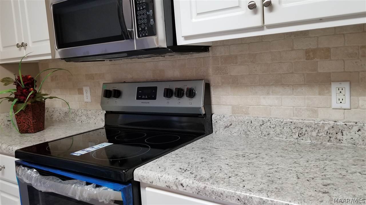 233 Eagle Bend Road Enterprise, AL 36330 - Photo 33 of 33 NEW STOVE AND MICROWAVE