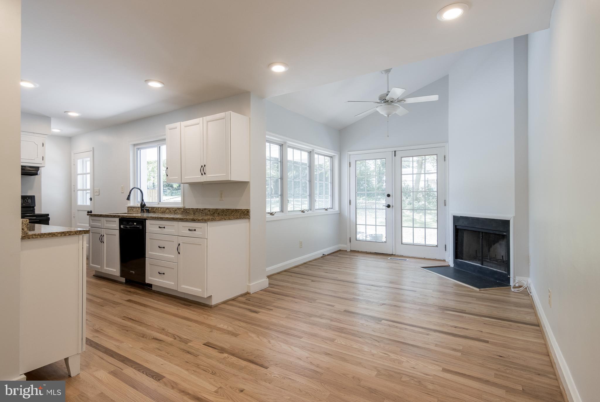 1206 Culvert Road Baltimore, MD 21286 - Photo 11 of 46 Open Granite Kitchen to DR & 1st Floor Family Room