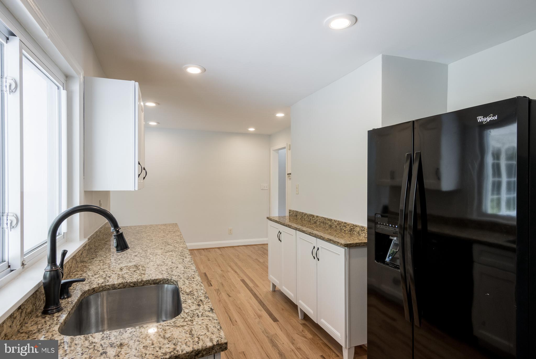 1206 Culvert Road Baltimore, MD 21286 - Photo 14 of 46 Kitchen w/ recessed Lights & Window To Backyard