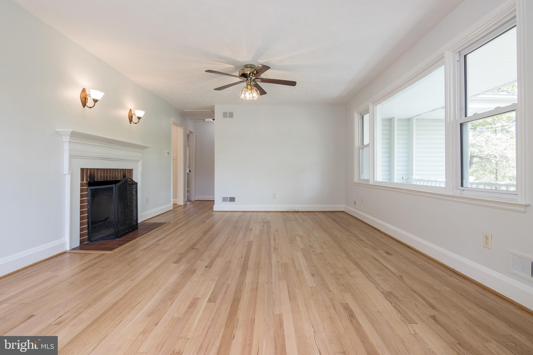 1206 Culvert Road Baltimore, MD 21286 - Photo 8 of 46 Living Room-Wood Burning FP-Refinished Wood Floors
