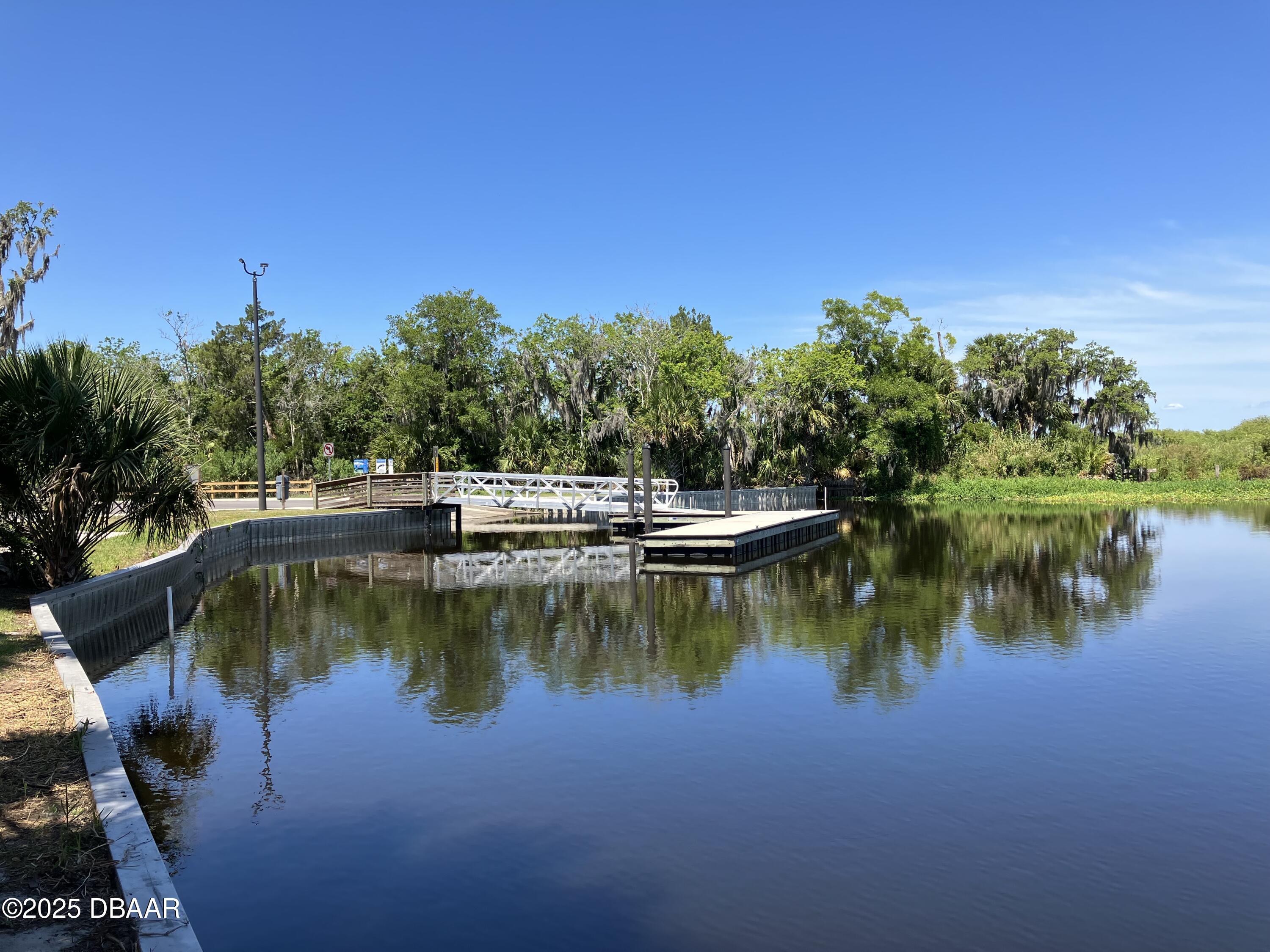 0 Shell Harbor Road Pierson, FL 32180 - Photo 8 of 8 a view of a lake with houses