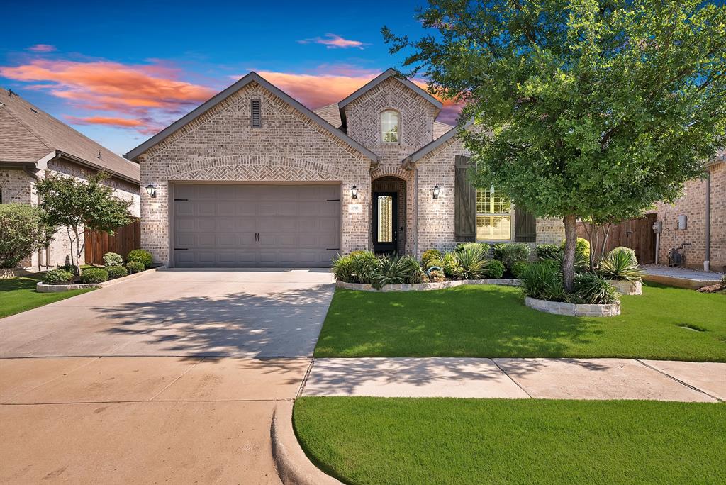 1709 Shetland Road Aubrey, TX 76227 - Photo 27 of 35 a front view of a house with garden