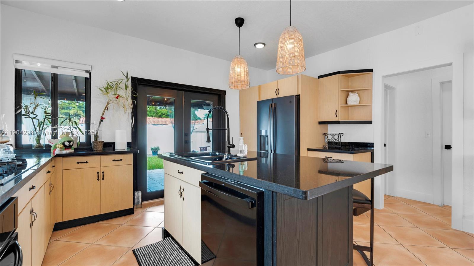2271 Southwest 25th Street, Unit 2271 Miami, FL 33133 - Photo 13 of 39 a kitchen with a sink stove and refrigerator