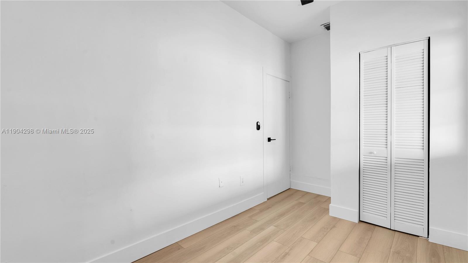 2271 Southwest 25th Street, Unit 2271 Miami, FL 33133 - Photo 25 of 39 a view of an empty room