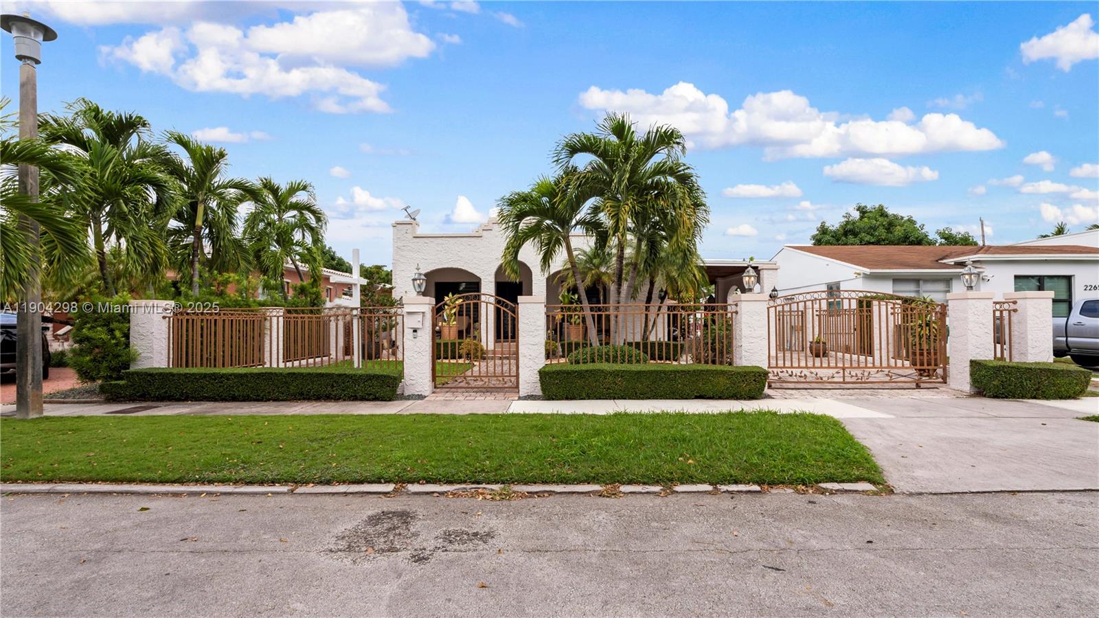 2271 Southwest 25th Street, Unit 2271 Miami, FL 33133 - Photo 4 of 39 a view of a house with a yard