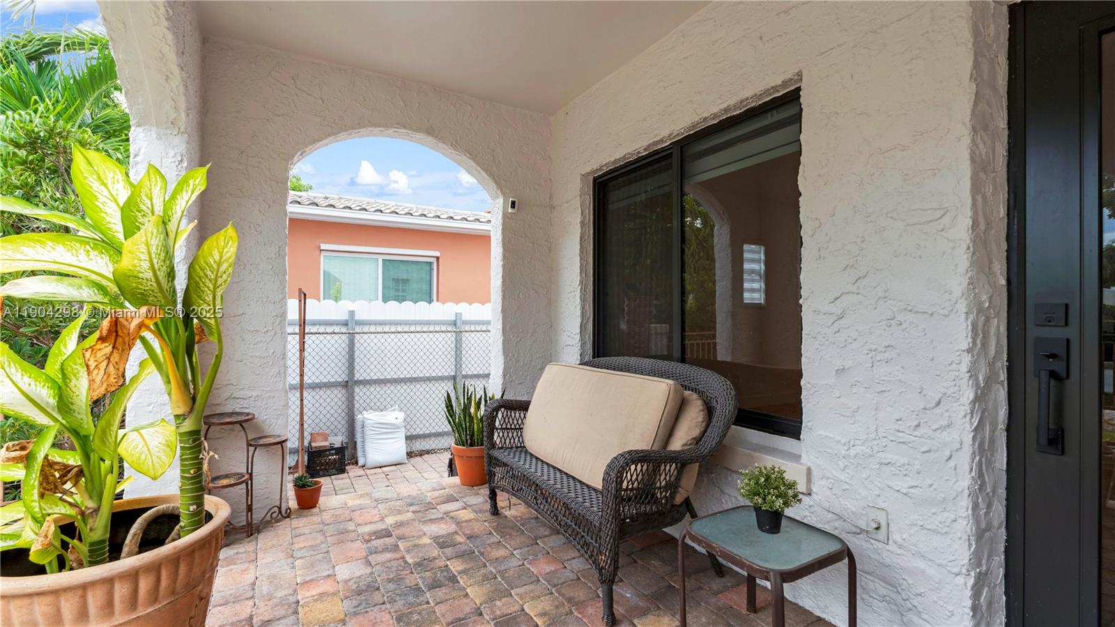 2271 Southwest 25th Street, Unit 2271 Miami, FL 33133 - Photo 6 of 39 a living room with furniture and a potted plant