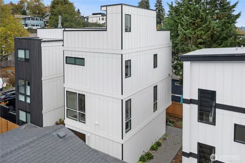an aerial view of a house with a garden