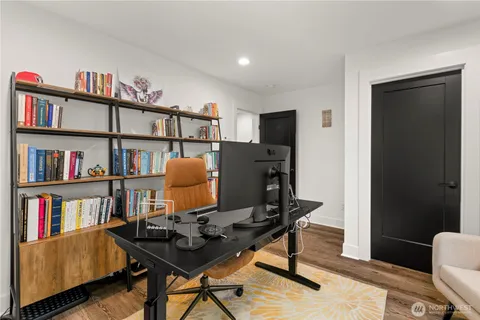 a room with a bed and a window